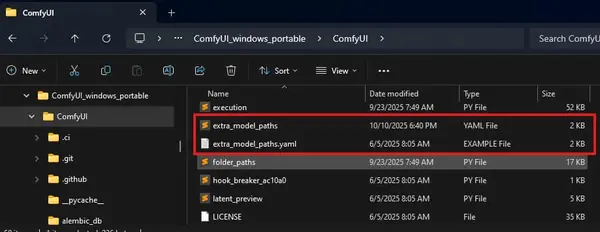 Windows Explorer showing extra_model_paths.yaml.example and the renamed extra_model_paths.yaml file in the ComfyUI folder