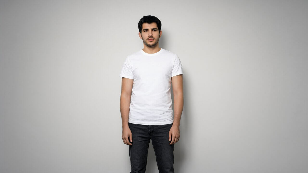 Photo of a man in a studio, used as the main reference image